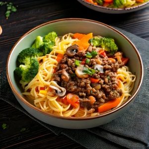 Émincé de bœuf aux champignons et oignons perlés