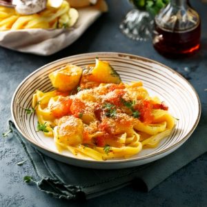 Medaglioni à la courge, sauce rosée au gratin
